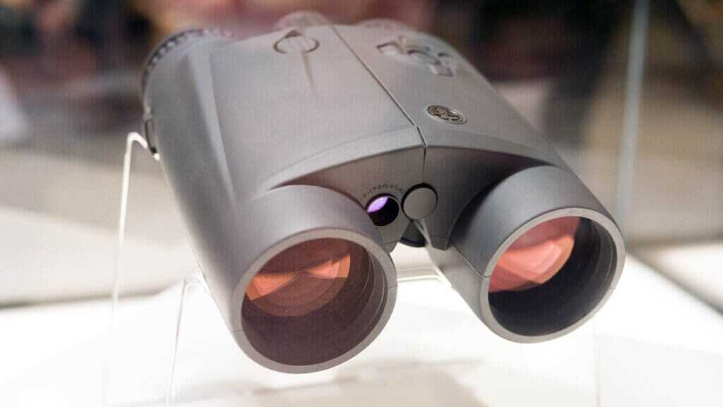 Front view of the binoculars on a stand, looking into the objective lens.