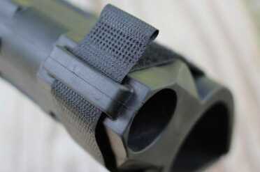 If you want the Velcro strap out of the way, it tucks neatly in the top of the brace.