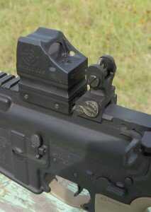 Shield CQS—A Good Red Dot Sight for SBRs The compact aluminum housing of the CQS is no wider than the backup iron sights mounted on this AR15.