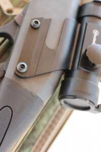 The Firefield Agility—A Versatile, Budget-Conscious 870 Sight The optic mounts with screws through the holes for the pins holding the fire control system.