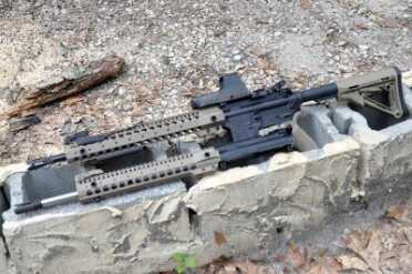 One barrel is stainless--the other is black. While simple, the color of the barrel is an easy indicator of caliber. 