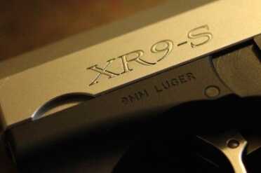 Boberg XR9-S The Bullpup Pistol Review The lettering has a radius that adds depth to the relief carving. Subtle, but a nice touch.