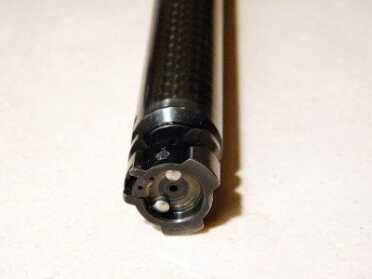 This is one strong bolt. Six locking lugs ensure a solid lockup and the recessed bolt face encloses the case head. Two spring loaded plungers and a short extractor provide for positive ejection.