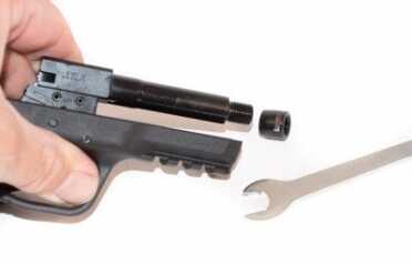 New Smith & Wesson M&P22 Compact Review The M&P22 Compact has a threaded barrel that comes standard, but you'll need an adapter to attach a silencer.