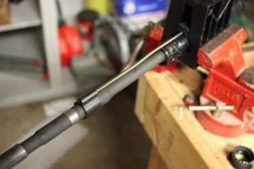 The low profile gas block allows for more clearance beneath the forend.