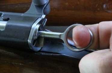 The safety is odd. You pull it out and set it to the side, or into that slot for really really safe. It is silent but awkward to use.