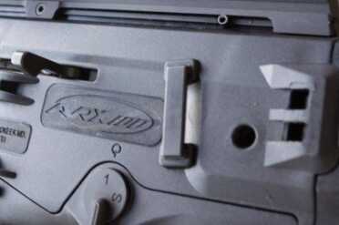 The receiver body has two of these web sling loops on each side.