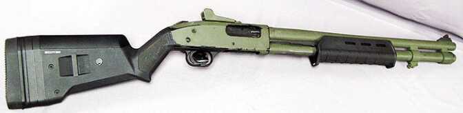 A Mossberg 590 tricked out with Magpul furniture and ghost ring sights. 
