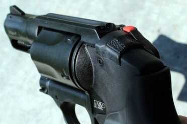 Smith & Wesson M&P .38 Hammerless Revolver w/Crimson Trace All of the controls are easily accessible with one hand, though reloading one handed isn't easy.