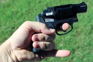 Smith & Wesson M&P .38 Hammerless Revolver w/Crimson Trace The grip offers enough room for two fingers, but the pinky will float below.