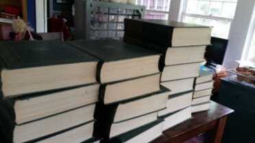 This entire set of Encyclopedia Brittanica was going for $25 as of yesterday on Ebay. You can often get books for less than the cost of shipping them to you. 