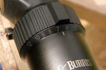 The Eliminator is variable from 3 power to 12 power with a knurled ring. The Raised bar aids in making quick adjustment and to overcome the drag of the seals.