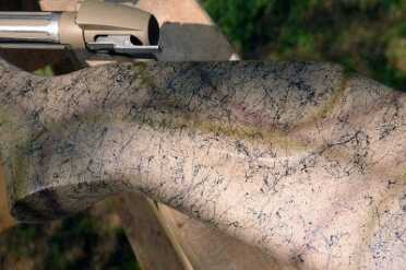 The composite graphite and Kevlar stock has good texture for secure handling.