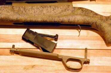 The magazine, spring, and follower.