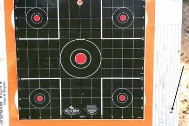 With no wind correction, the first round at 511 yards impacted 9 ½” low right.