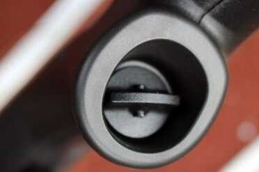 The stock screws onto the receiver through the grip. 