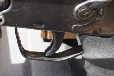 The trigger is cast, and wide.