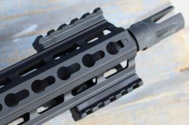 The rails come on the side. The first change I'd make would be a forward hand stop here on the bottom.