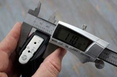 At the widest point, the grip is only 1.10".