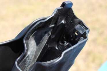 The Best SIG P226? The TacOps--Review The retention system inside the Safariland holster.