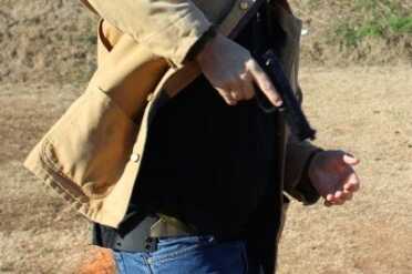 2A Holster and Mag Carrier--Review The whole draw, from concelement to first shot, runs right at 1.5 seconds. I need to get it down to 1 second.