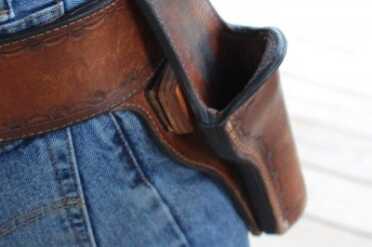 Choosing a Cowboy Action Holster~El Paso Saddlery Note the leather block behind the holster to push the grip out from the hip.