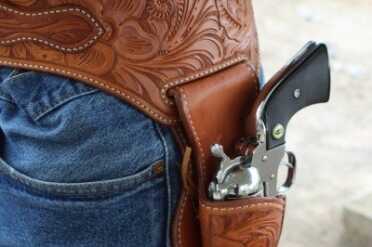 Choosing a Cowboy Action Holster~El Paso Saddlery The holster rides in a cut out in the belt. All edges are stitched for extra strength.