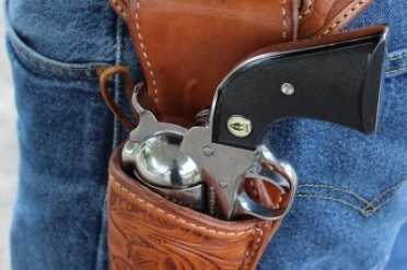 Choosing a Cowboy Action Holster~El Paso Saddlery Don't leave the loop dangling, though, as you may catch it on the hammer.