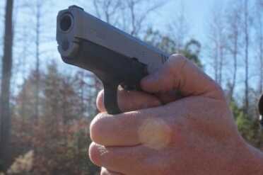 Kahr CT380--The Perfect Pocket Pistol? Looking down the muzzle you can see how thin the frame and slide actually are.