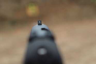 The front sight comes in three sizes. Each is a simple white dot post. 