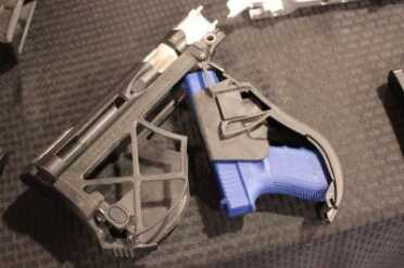 The stock open with a blue gun ready to go.