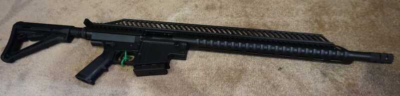 The New UTAS AR pattern Shotgun--SHOT Show 2015 The length of the UT-X makes photography challenging, especially in the confined space of a SHOT Show booth.