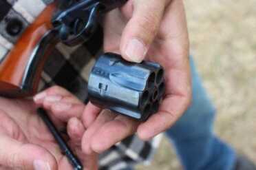 The charcoal blue on the cylinder. 