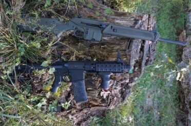 The SU16 next to a Colt SBR. The two couldn't be any more different. 