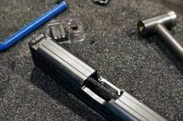 Perfecting the already Perfect H&K VP9 The old sights push out with a bit of leverage.