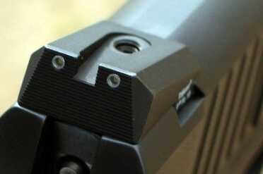 Sloped sights? What's the point? Are they designed to be easier to put back in the holster?