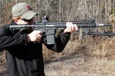 A red dot on a .308 may seem like a missed opportunity, but these heavy guns have their place in close quarters combat, too, and the extra speed gained is an asset.