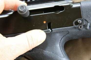 Cheap Guns: Hi-Point 45ACP Tactical Carbine - 4595TS Review The safety is difficult to drop with your shooting hand, and the red dot is on safe, not fire, which is the opposite of most guns.