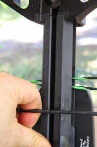 To seat the bow into the forearm, you push down while pulling up on the string. 