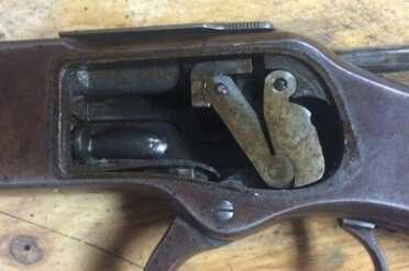 Action open. It works kind like a knuckle. 