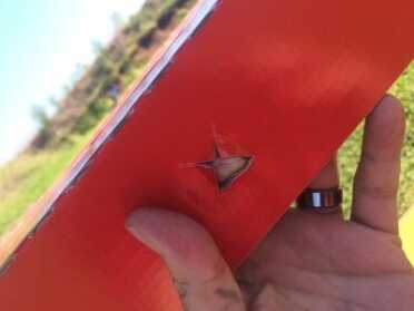The shelves have holes that make hanging cans easy. 