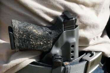 The wings don't get in the way of carry. 