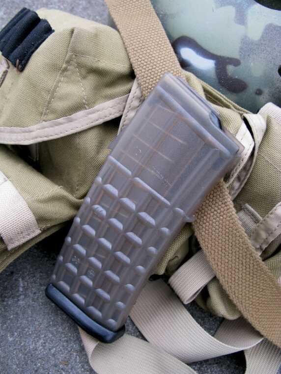 The Steyr AUG M3 A1--A New Take on the Old Bullpup The AUG's magazine was probably one of the first commercially successful polymer magazines in the industry. The waffle pattern is easy to grip and I experienced no feeding issues throughout our shooting sessions