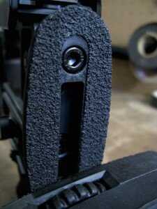 There is an extra grippy material used on the stock that helps keeps adjustments glued in place with just a little tension.  The thumbwheel also makes it easy to fit the recoil pad to the shoulder