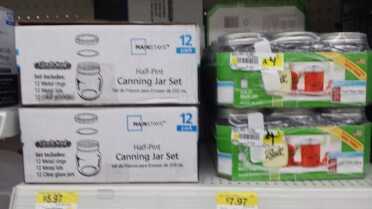 Jars come in several sizes with two sizes of lids. Walmart has their own brand, and they seem to be just as good as the Ball brand.  Your canning directions will tell you how big you can go for different types of food. For fish and meat you are better to use pint and half pint, unless you have a big family or group that will eat at the same time. 
