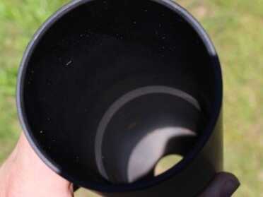 Hard to photograph, but you can see the step inside to support the bottom of the can.