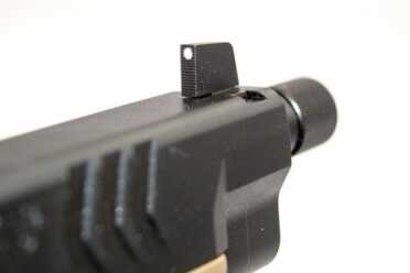 Front sights are extra tall to see over large silencers.