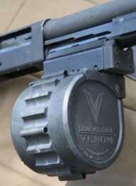 The rotary mag can be loaded either way and mounted on the magwell facing left or right. 