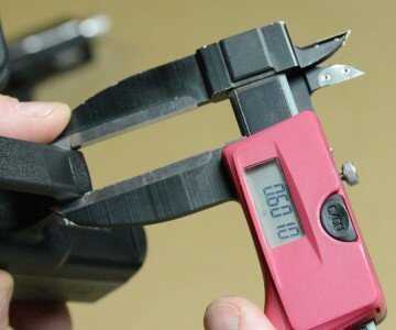 The GLOCK trigger guard is just a touch wider, and has a protrusion on the end that is missing from the Timberwolf.