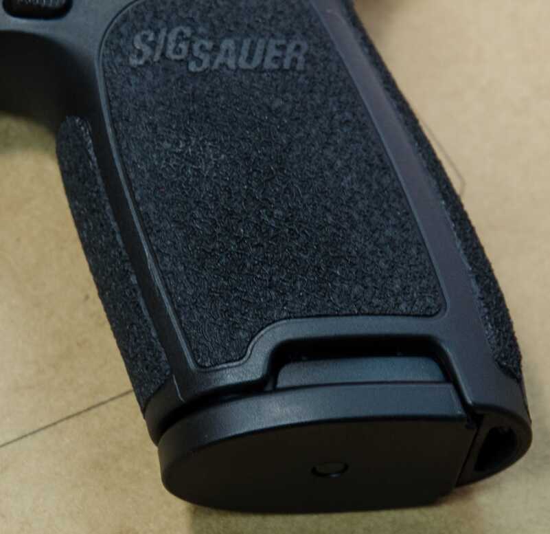 SIG SAUER P320 Grows up – to .45 ACP (Review) Magazine fit is perfection. Perfectly flush on every side with finger tabs in the unlikely event that assisted removal is necessary.